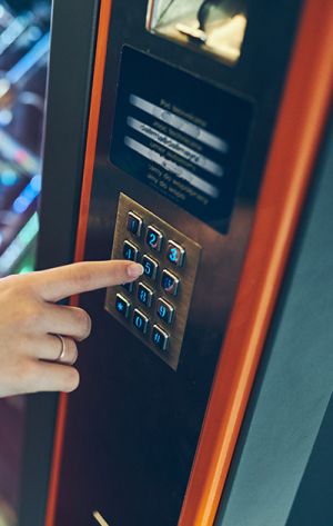 woman using a vending machine
