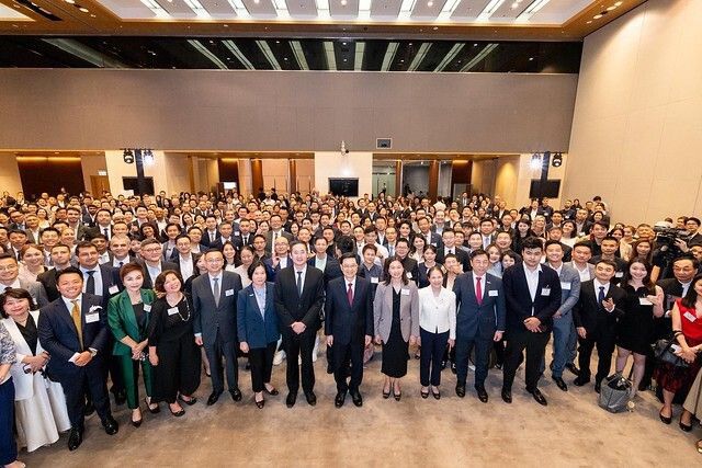 All execs pose for a group photo