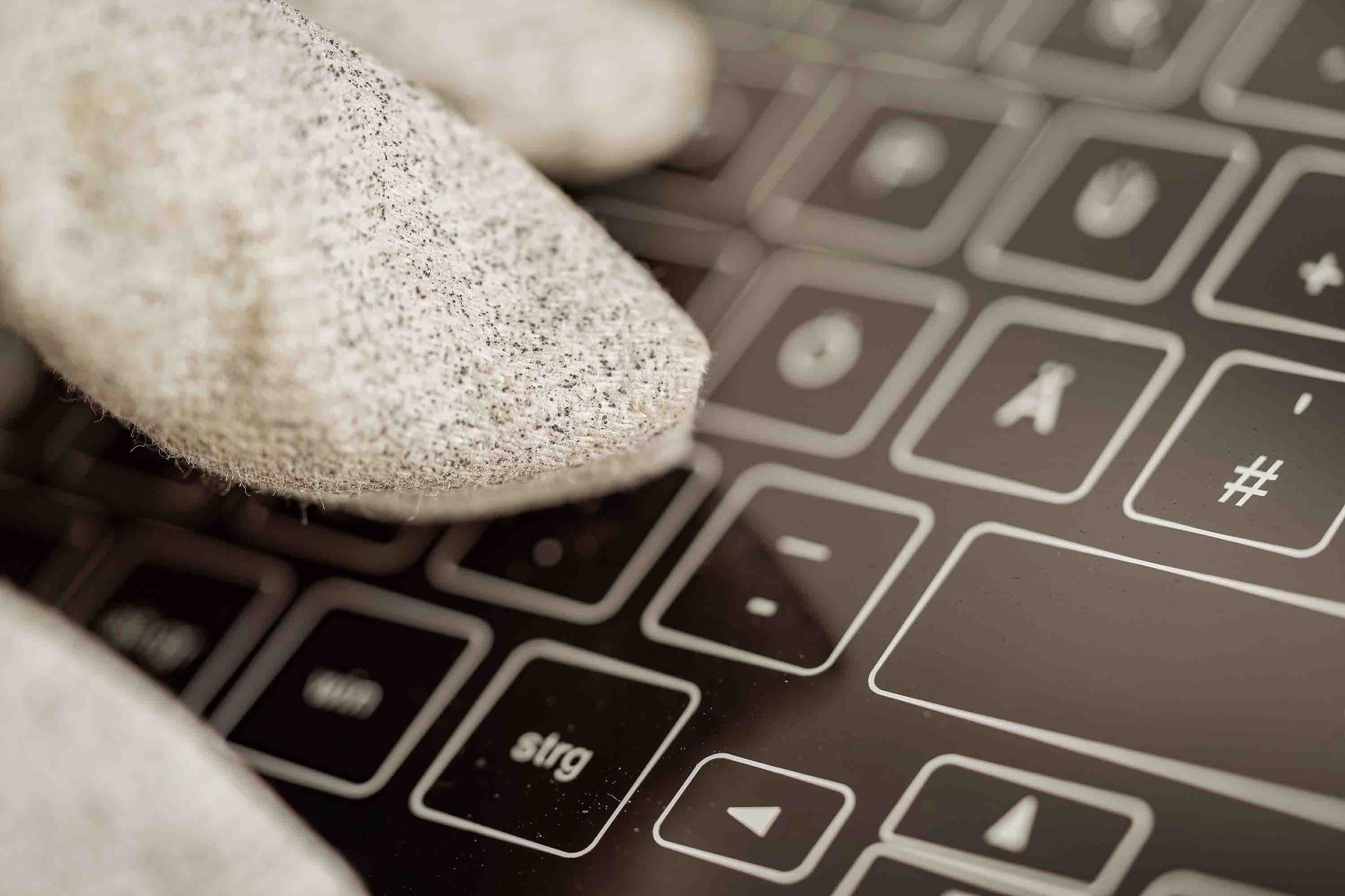Glass keyboard being used with gloves